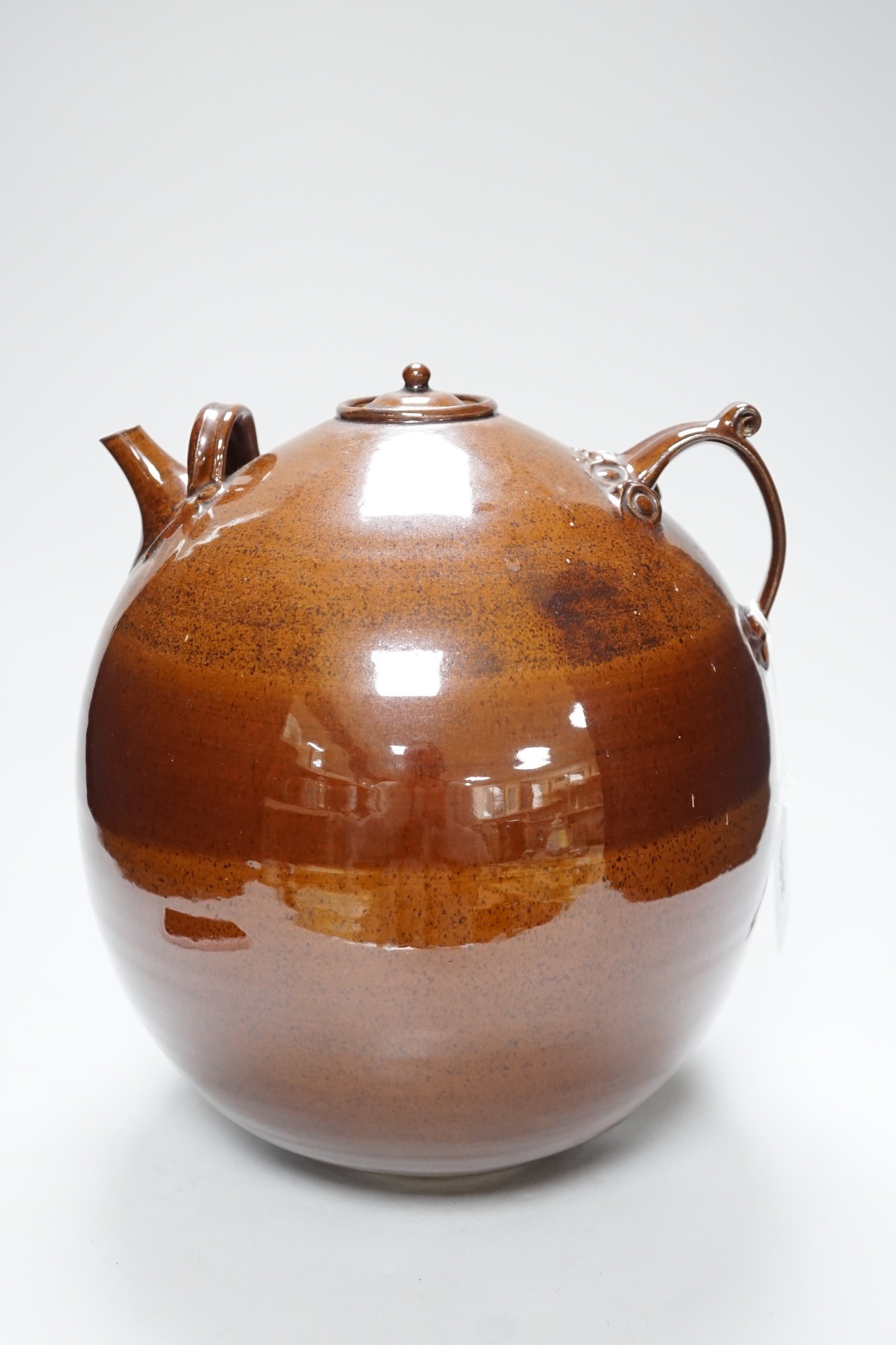 A Doug Bignell 'Alice in Wonderland' brown glazed teapot (a unique piece commissioned by the current owner), 30cms